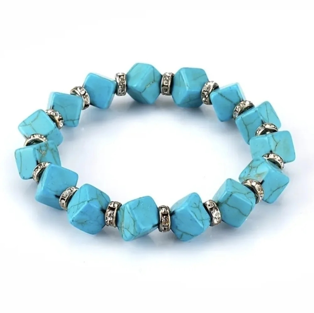 Pretty faux turquoise color beaded bracelet with CZ accents, cube shape beads